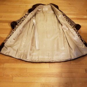 Genuine leopard skin coat with mink trim